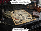A styled tabletop scene featuring a parchment-style 2027 Wheel of the Year page laid on a dark carved table, surrounded by occult-themed props including apothecary bottles, a dagger, dried herbs, a metal chalice, and a leather journal. Text banners read 'Complete Your Collection' and '2027 Wheel of the Year'.