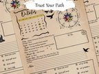 A close-up of a printed monthly calendar journal page with a beige parchment-style background, black decorative text and illustrations, a small October calendar, and a highlighted moon phase section. Another page is partially visible behind it.