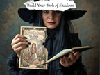 A woman in witch attire holds up a 2027 'Witch Calendar Planner' with an illustrated cover, while also holding an open book. A torn white banner at the top reads 'Build Your Book of Shadows'.