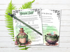 Two printed pages with green salt recipe and illustrations on a wooden surface with fern leaves.