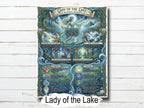Framed artwork titled 'Lady of the Lake' on a wooden surface