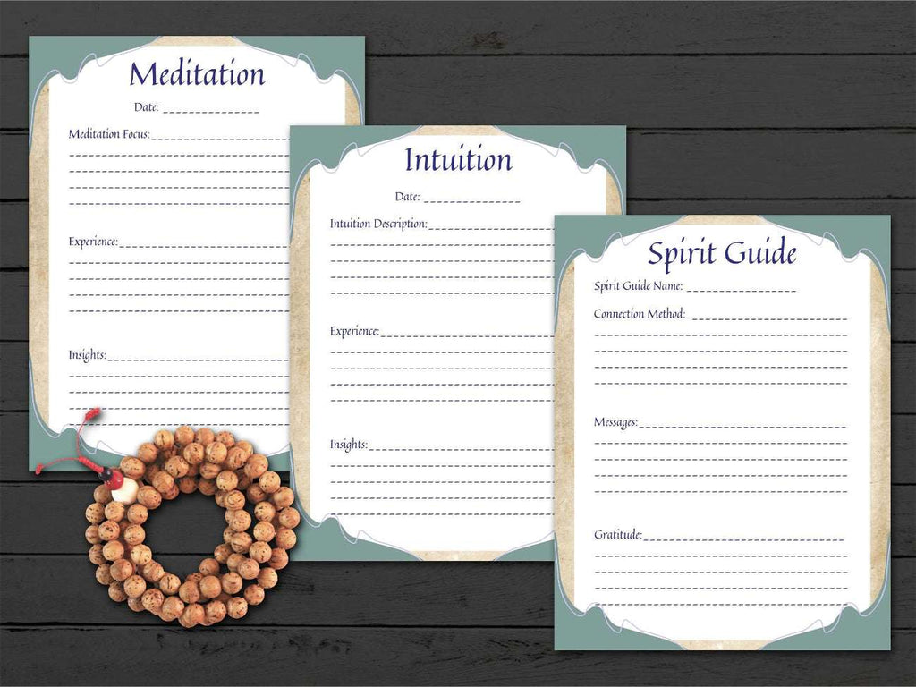 Three journal pages with headings for Meditation, Intuition, and Spirit Guide on a wooden surface.