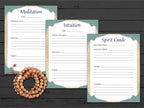 Three journal pages with headings for Meditation, Intuition, and Spirit Guide on a wooden surface.
