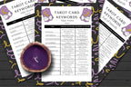 Closeup view of Tarot card keyword sheets, Major Arcana and Suit of Swords, with a purple candle on a wooden surface