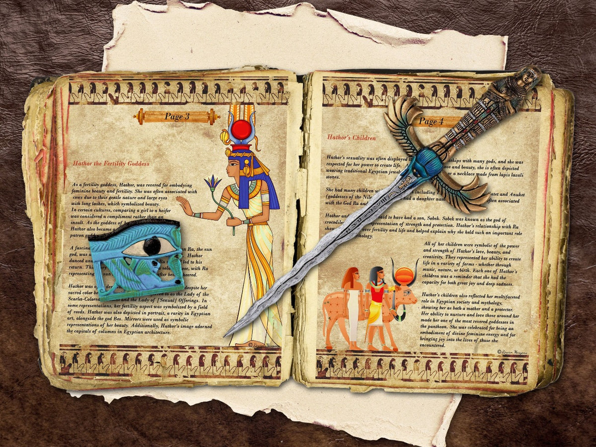 Two pages with images and text about the Goddess Hathor placed in a worn book of shadows.
