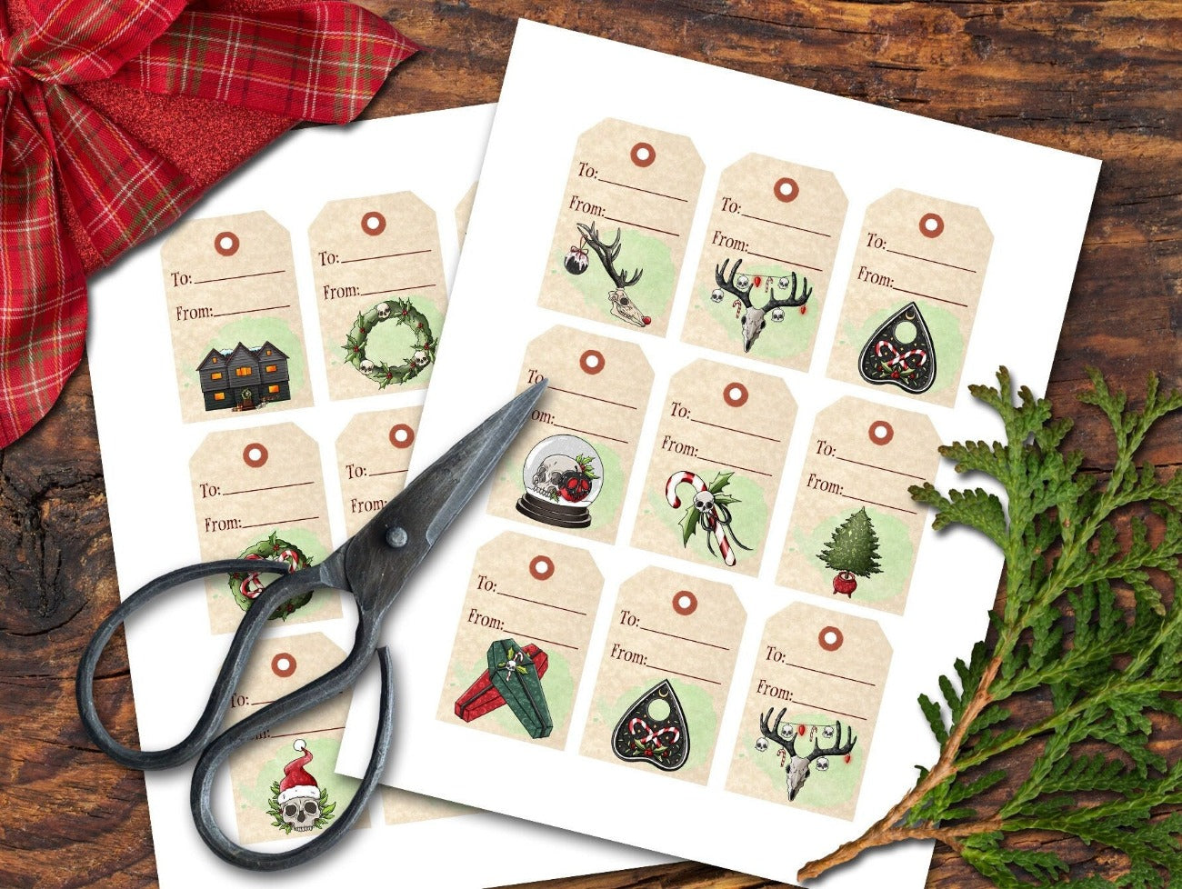 SCARY CHRISTMAS Gift Tag Labels two sheets ready to be cut out with scissors placed on top of them - Morgana Magick Spell