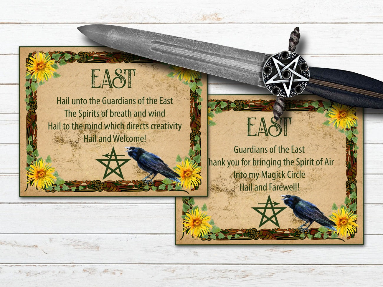 East Invoking and Banishing Quarter Cards. Each card has a floral border with a crow and pentacle with an arrow indicating the correct way to draw it.
