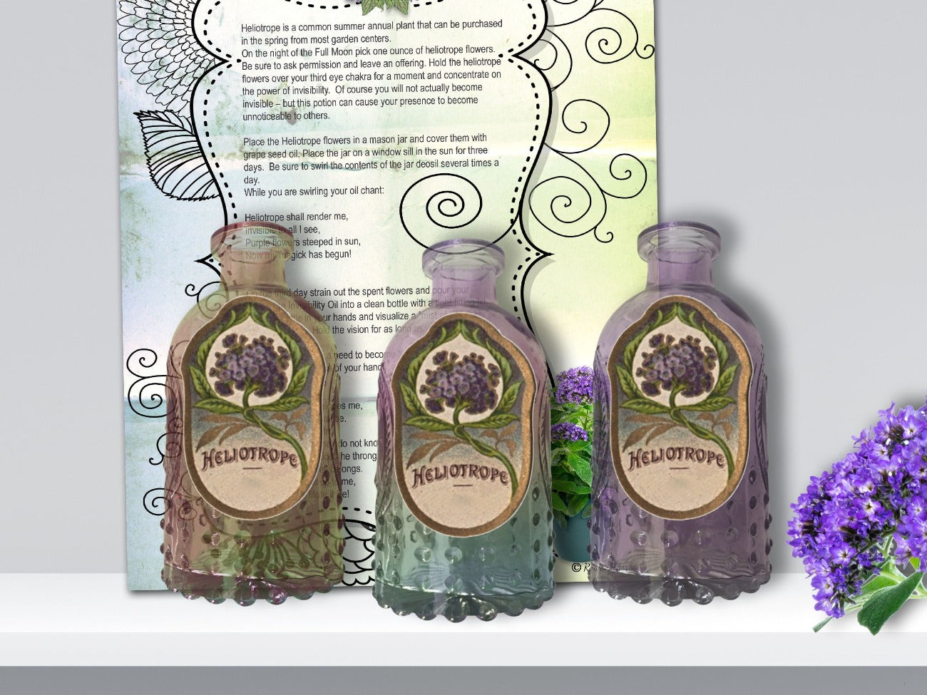 Heliotrope Invisibility Spell, labels placed on three fancy glass bottles with the spell page placed behind them - Morgana Magick Spell