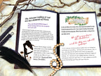 Open Book of Shadows with two pages from Learn Wicca Lesson 1 placed on a witchcraft altar with a black feather and gnarly tree branches.